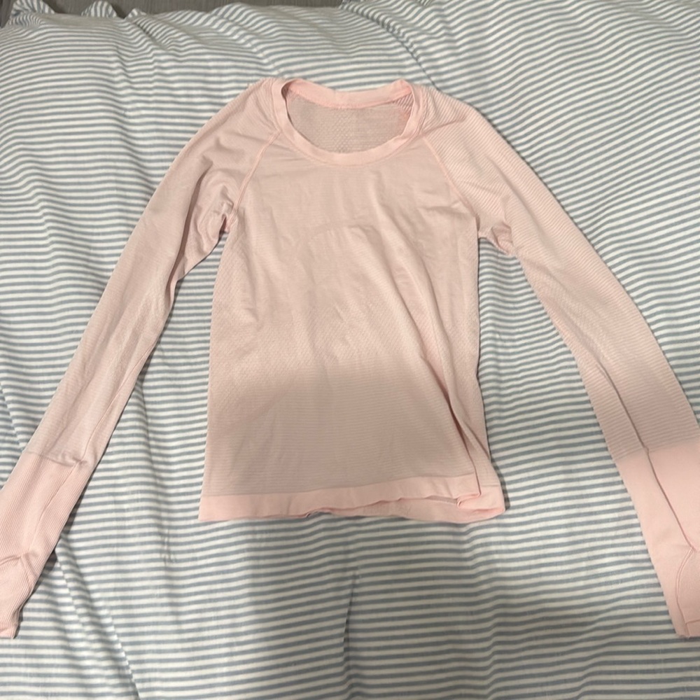 discontinued lululemon swiftly tech long sleeve shirt waist length.